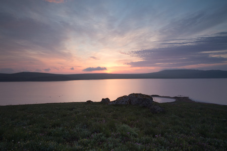 Russia. The movement of clouds in the spring in the steppe part of the Crimea peninsula at Cape Opuk.の写真素材