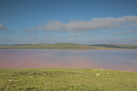 Russia. The movement of clouds in the spring in the steppe part of the Crimea peninsula at Cape Opuk.の写真素材