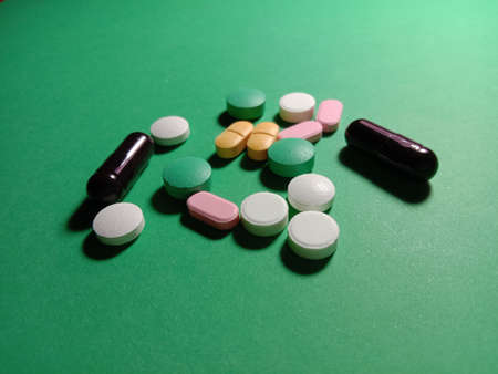 Medicines on green backgroundの写真素材