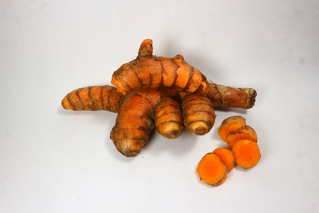 Fresh turmeric on white background, herb for health.の写真素材