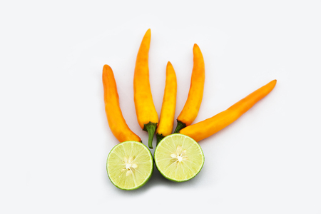 Hot Chili and Green lemon on white background,Thailand cooking.の写真素材