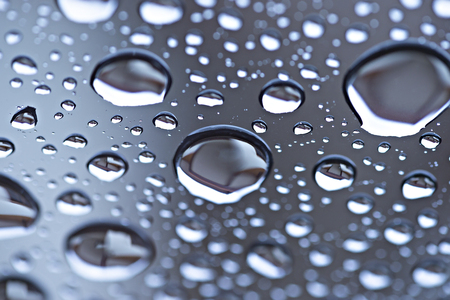 Drops of water on blue light backgroundの写真素材