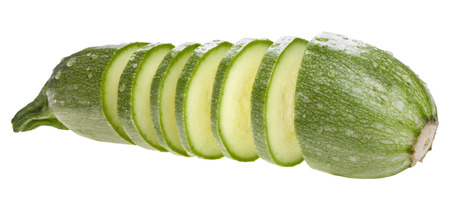 slices zucchini isolated on white backgroundの写真素材