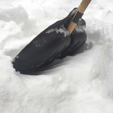 black plastic shovel for snow removal, snowdriftの写真素材