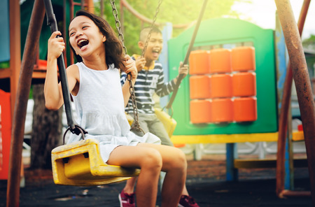 Children Happiness on swingの写真素材