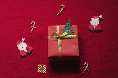 Flat Lay Christmas Gift Box on Red Background.の写真素材