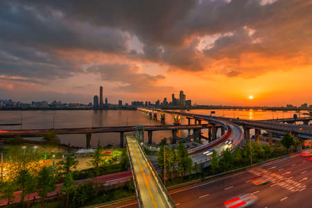 Sunset of Seoul downtown , 63 Building and Hangang river best view landmark and traffic in Seoul,South Koreaの写真素材