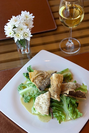 Salad with Jalapeno Dressing and Crispy Salmon Skin の写真素材