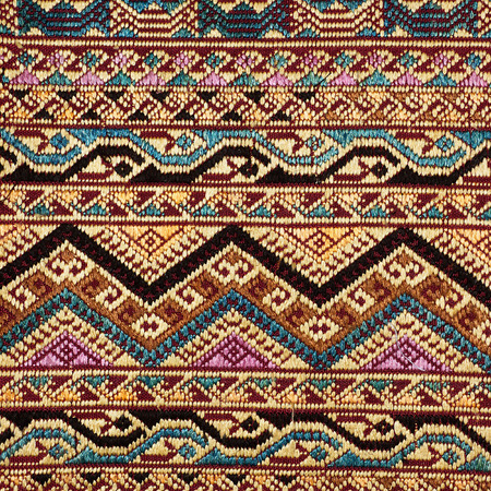 Old colorful thai Silk vintage Vintage fabric Thailand is made of hand-woven cotton fabric  Are most commonly used in the Northeast of Thailand の写真素材