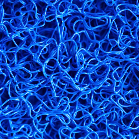 Texture background of the blue plastic doormat 