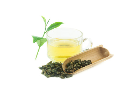 Glass Cup Tea with tea Leaf  Isolated on White Background.
