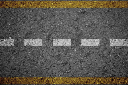 Asphalt Road texture with Yellow and white stripの写真素材