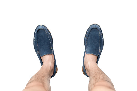Male feet isolated on white background.