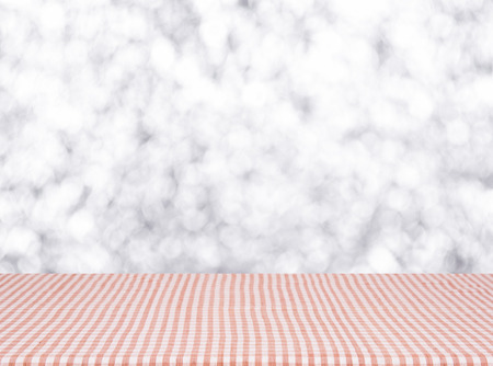 Empty red tablecloth material wooden, deck, tablecloth with blurred abstract background. for product...