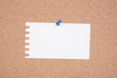 White Paper A To Do List pinned to a cork notice board.の写真素材