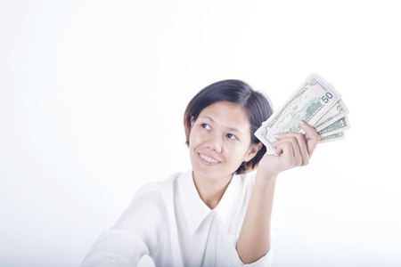 business women hand holding dollar bill money. concept saving finance and investment.