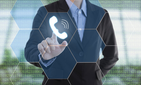 Businessman hand pressing button support call. sign on virtual screen. business concept.の写真素材