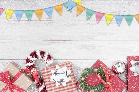 Christmas background with decorations gift box and snowflake on white table.の写真素材