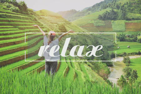 backpacker with valley rice terraces of a mountain at sapa vietnam and relax text.の写真素材