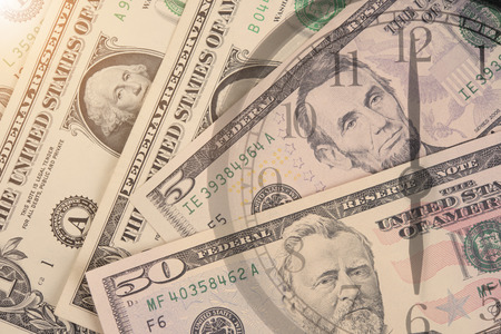 time is money. Double exposure alarm clock and dollar money. concept business save finance. の写真素材