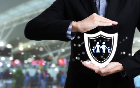 business salesman agent hand holding family concept assurance health-care insurance.の写真素材
