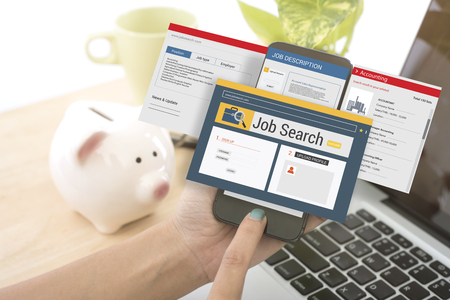 hand using smart phone with Job Search web homepage on screen. concept interview, hiring, recruitment.の写真素材
