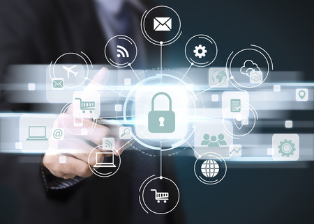 Businessman hand pressing button Data Protection. sign on virtual screen. business security concept.