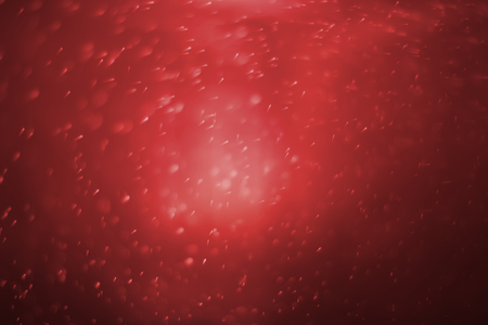 Abstract red glitter bokeh. concept christmas and new year for background.の写真素材