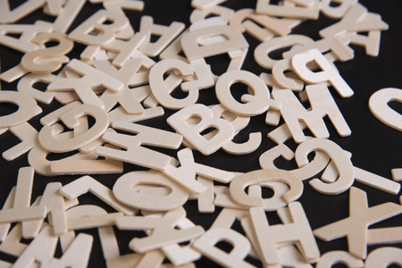 brown wood english alphabet on table.の写真素材