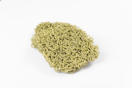 green instant noodle isolated on white background.の写真素材