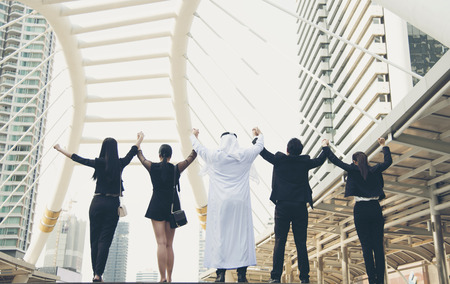 Arab business teamwork hands up. concept celebration success for work.の写真素材