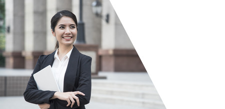 Portrait young asian businesswoman handsome looking for something. panoramic banner with copy space.の写真素材