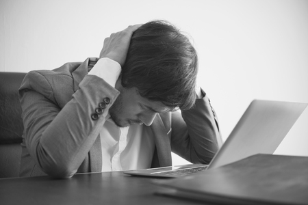businessman stressed and unhappy for work in the office. life style stress.の写真素材