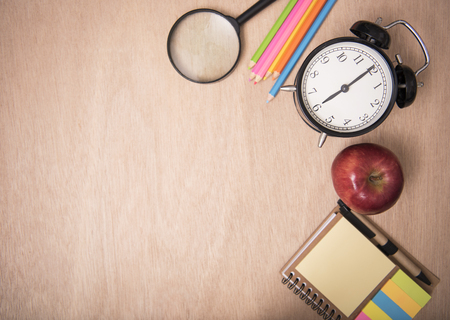 School supplies on wood table background. empty copy space.の写真素材