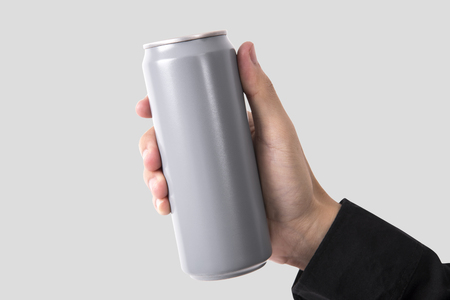 Hand Holding Aluminum can for mockup template advertising and branding background.の写真素材