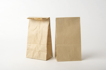 Blank brown paper bag for mockup template advertising and branding background.の写真素材