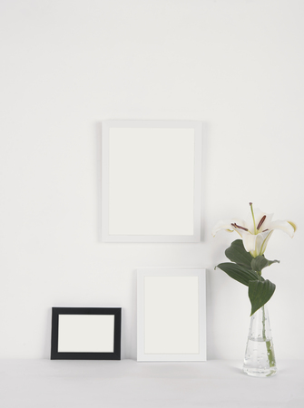 Blank Photo Frame on Wooden for Design Mockup Template.の写真素材