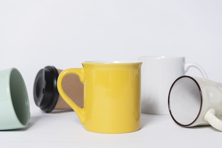 Minimal coffee cup on table. mock up for creative design branding object.の写真素材