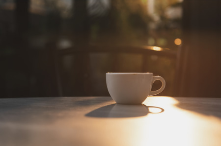 espresso coffee cup on table cafe and sunlight in the morning.の写真素材