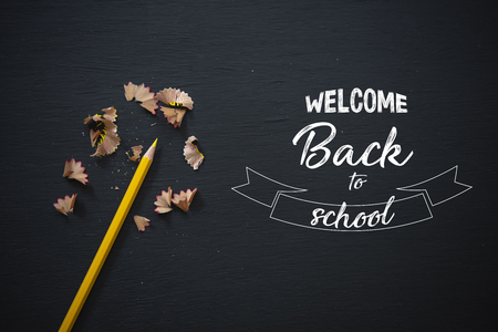 education and supplies for banner background on blackboard top view with copy space. Back to school concept.の写真素材
