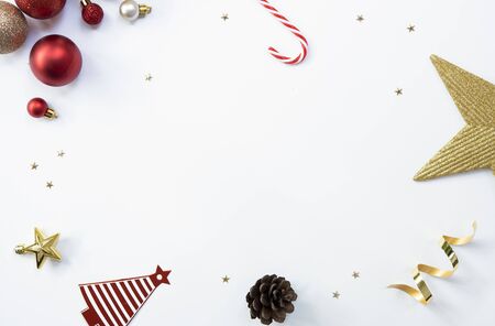 Mock up greeting paper card on white background with Christmas decorations and confetti. Invitation...