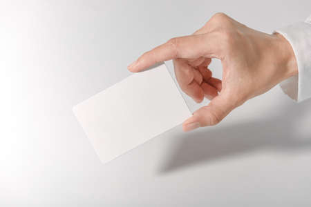 Mockup business card on white background. Template for branding identity and company name.