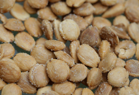 Salted almonds foreground in studioの写真素材