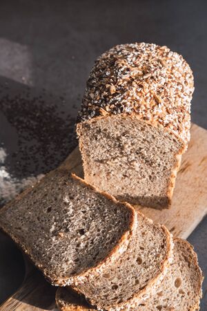 Homemade millet and buckwheat bread slices. Vertical picture