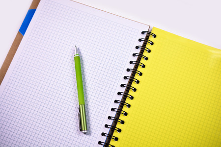 Clean your notebook with penの写真素材