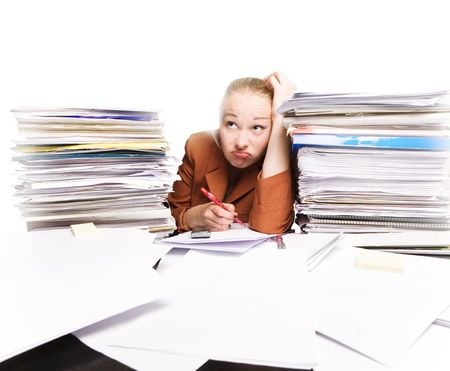  	tired and frustrated businesswoman at the desk in the office