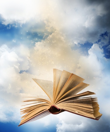	flying opened magic bookの写真素材