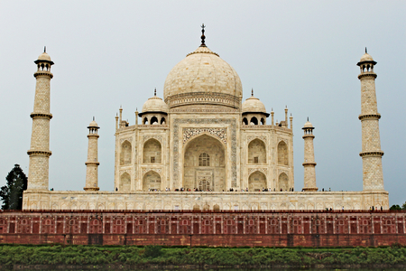India, Agra, July 23, 2017 - Taj Mahal temple with red brick wall around;のeditorial素材