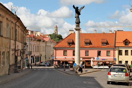 Lithuania, Vilnius; August 14th 2017 - Angel Square in Vilnius in Lithuania with a monument of patron Angel and old buildings around the square. Zarzecze district.のeditorial素材