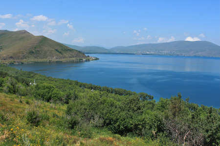 Lake Sevan - the largest lake in Armenia and the Caucasus region; freshwater alpine lake surrounded by mountainsの写真素材